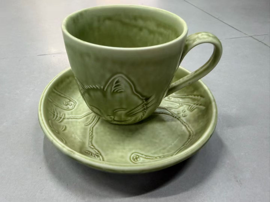 Jade Spring Napping Cat — Jingdezhen Secret Hue Celadon Embossed Mug & Saucer Set
